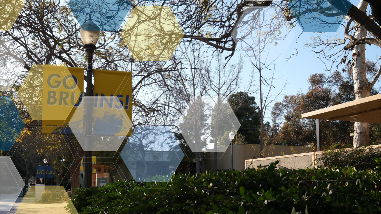 Go Bruins! lamppost sign with a blue, yellow, and white UCLA molecule overlay